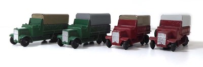 Lot Four Dinky 25s six wheeled wagons, various...