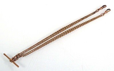 Lot 506 - A 9ct yellow gold double Albert watch chain...