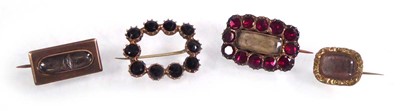 Lot A 19th century yellow metal mourning brooch of...