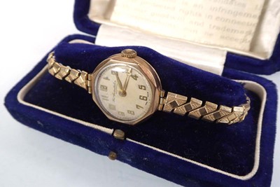 Lot 444 - A ladies 9ct yellow gold wristwatch by Thomas...