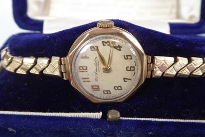 Lot 444 - A ladies 9ct yellow gold wristwatch by Thomas...