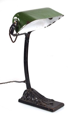 Lot 95 - A 1930's French cast metal bankers lamp by...