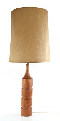 Lot 66 - A 1960/70's undulating turned teak table lamp,...