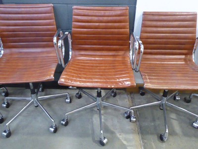 Lot 5034 - Chromed swivel armchair with leather seat in...