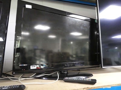 Lot 2276 - Technika 32" TV with stand and remote, model...