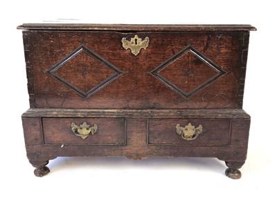 Lot 8 - A 18th century and later oak coffer of small...