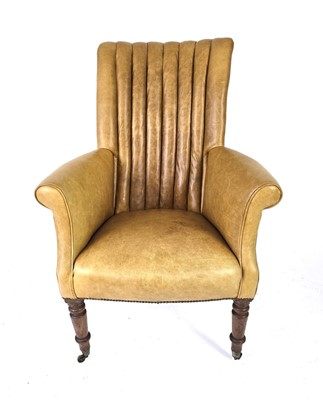 Lot 10 - A Victorian club or fireside armchair...