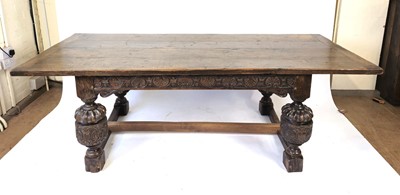 Lot 11 - An oak refectory table, the four-plank top...