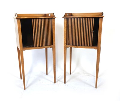 Lot 16 - A pair of Sheraton style satinwood cabinets,...