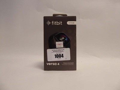 Lot 1004 - Fitbit versa 4 Fitness smartwatch, boxed with...