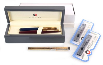 Lot 103 - A cased Sheaffer gold electro-plated fountain...