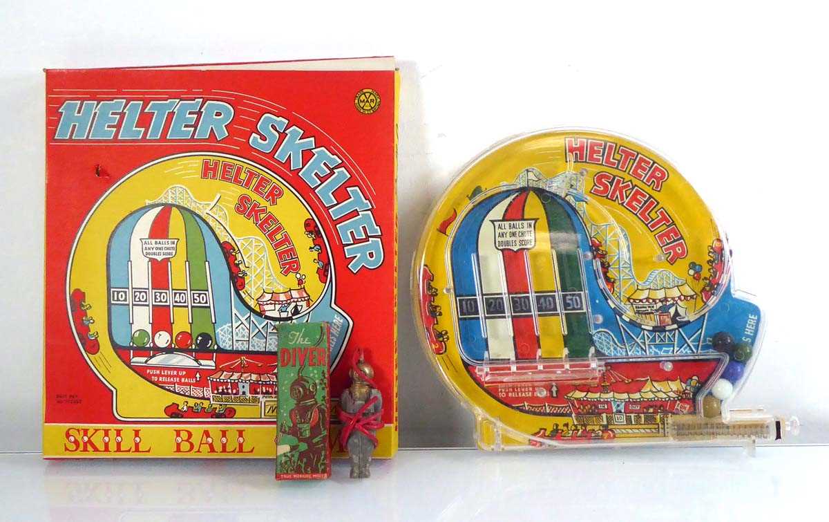 Lot 192 - A Marx 'Helter Skelter' skill ball game and a...