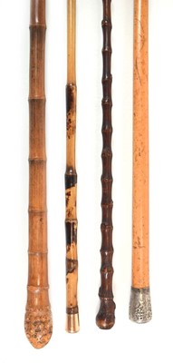 Lot 123 - An Edwardian walking cane by Swaine & Adeney...