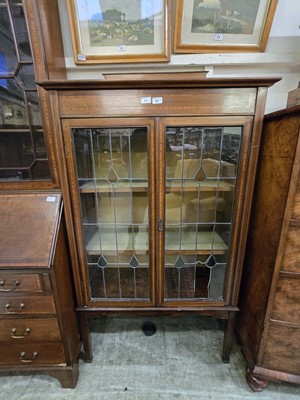 Lot 67 - A Sheraton revival mahogany inlaid glazed...