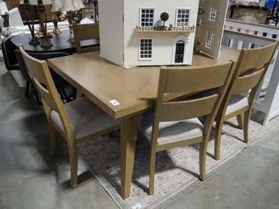 Lot 1242 - Wooden extending dining table with 5 chairs