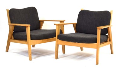 Lot 51 - A pair of contemporary oak framed armchairs...