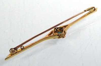 Lot 532 - A 15ct yellow gold bar brooch set a turquoise...