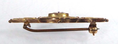 Lot 533 - A 9ct yellow gold bar brooch of Etruscan...