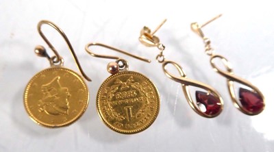 Lot 536 - Three pairs of yellow metal ear pendants...