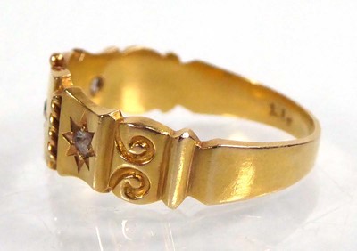 Lot 545 - An Edwardian 18ct yellow gold ring set three...