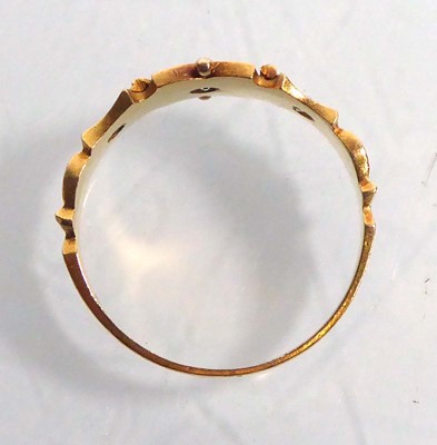 Lot 545 - An Edwardian 18ct yellow gold ring set three...