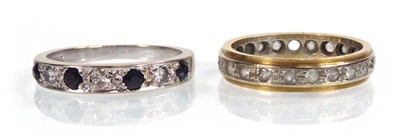 Lot 546 - An 18ct yellow gold half eternity ring set...