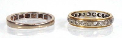 Lot 546 - An 18ct yellow gold half eternity ring set...