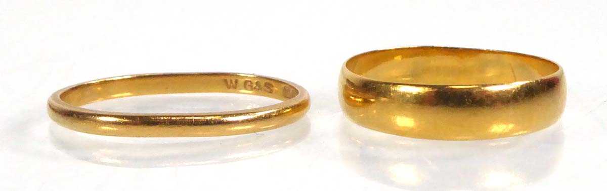 Lot 547 - Two 22ct yellow gold wedding bands, London...