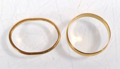 Lot 547 - Two 22ct yellow gold wedding bands, London...