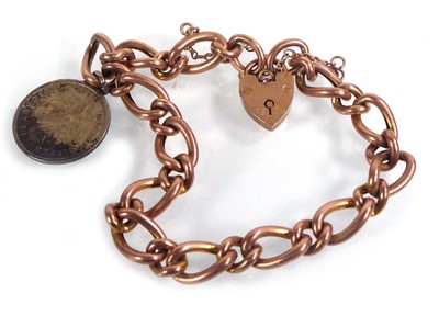 Lot 549 - A 9ct rose gold hollow curblink bracelet with...