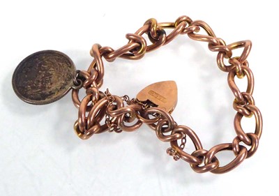 Lot 549 - A 9ct rose gold hollow curblink bracelet with...