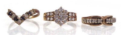 Lot 553 - Three 9ct yellow gold dress rings set paste...