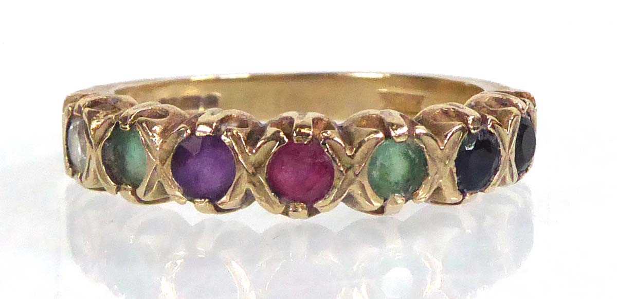 Lot 558 - A 9ct yellow gold multi gem set 'Dearest' ring,...