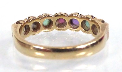 Lot 558 - A 9ct yellow gold multi gem set 'Dearest' ring,...