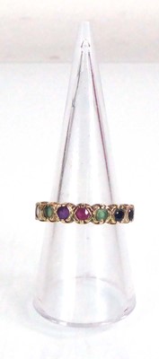 Lot 558 - A 9ct yellow gold multi gem set 'Dearest' ring,...