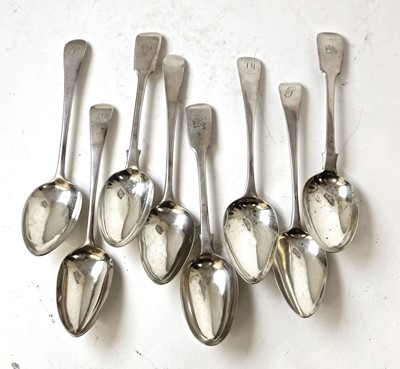 Lot 414 - Eight Georgian and later silver serving spoons....