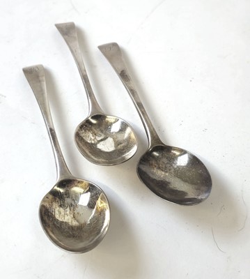 Lot 415 - Three George II silver teaspoons. Hallmarked...