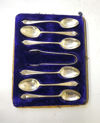 Lot 427 - A set of Edwardian silver teaspoons with sugar...