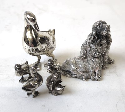 Lot 431 - A small silver filled model of a dog and a cat...