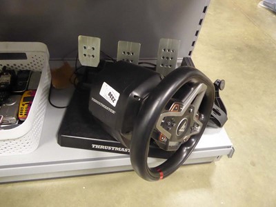 Lot 2330 - Thrustmaster steering wheel and pedals,...