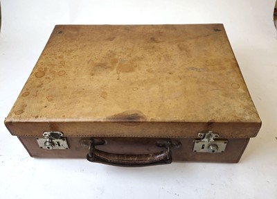 Lot 205 - A 1920's gentleman's travelling case in tan...