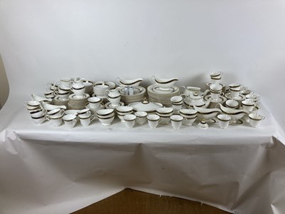 Lot 220 - A Royal Doulton dinner service decorated in...