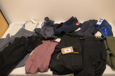 Lot A bag containing 12 pairs of trousers/shorts...