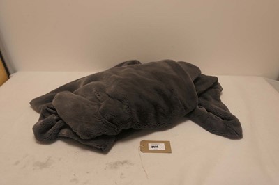 Lot A bag containing a faux fur blanket/throw