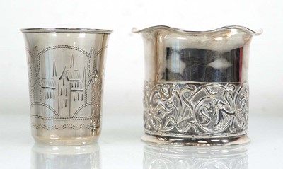 Lot 358 - A small Russian silver beaker engraved with...