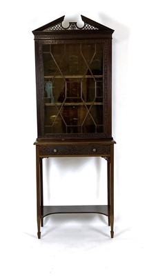 Lot 33 - A late 19th century mahogany display vitrine...