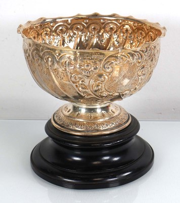 Lot 370 - A late Victorian silver repousse decorated...