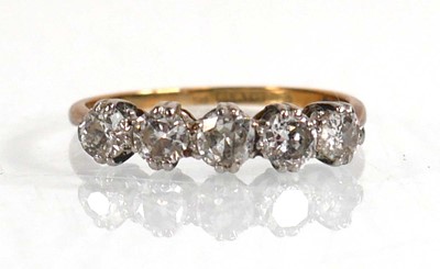 Lot 569 - An 18ct yellow gold and platinum highlighted...