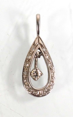 Lot 570 - A white metal pendant of teardrop form...