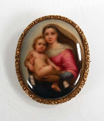 Lot 571 - An oval brooch depicting the Madonna and child...